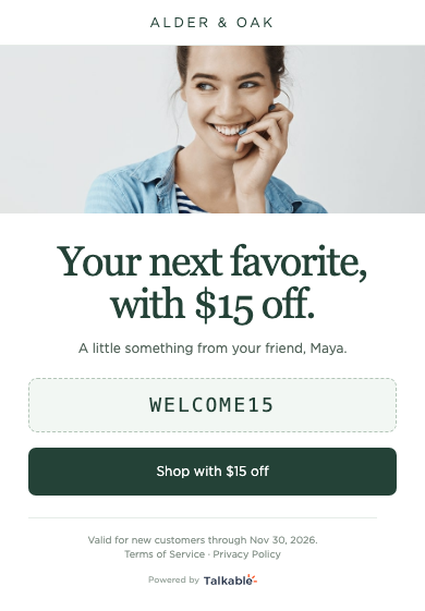 A friend's invitation with a $15 reward and a Shopify discount code